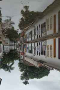 Colonial city of Paraty, Brazil and its wonderful reflection in the tide's waters